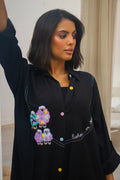 PEONISA Rifq black abaya with colorful embroidered motifs, contrast stitching and multicolor buttons